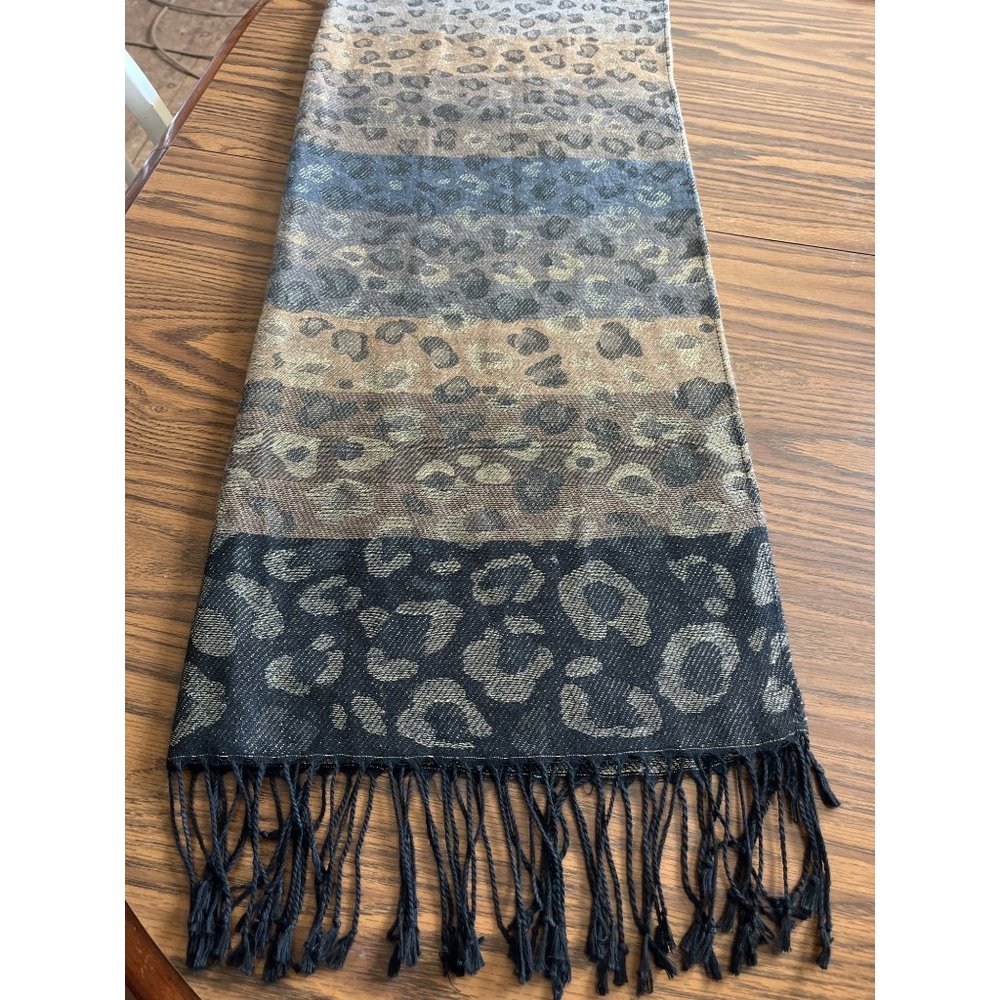 Black and gold leopard look scarf with black fringe